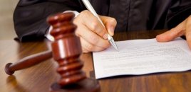 Dələduzluqda təqsirləndirilən tikinti şirkətinin rəhbəri axtarışa verilib