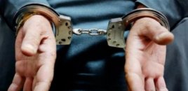 Polis Bakıda mağazaları talayan şəxsi saxladı