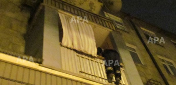 Bakıda 23 yaşlı qızı mənzildən belə xilas etdilər - FOTOLAR