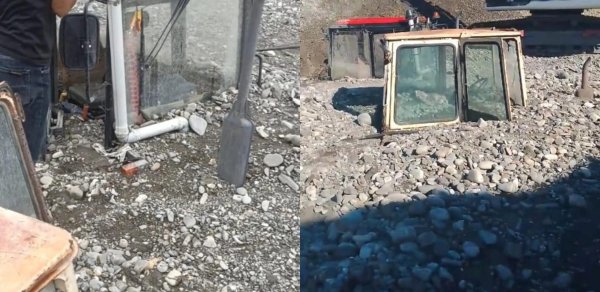 Ağdaşda güclü sel: Traktorlar çınqılın altında qaldılar