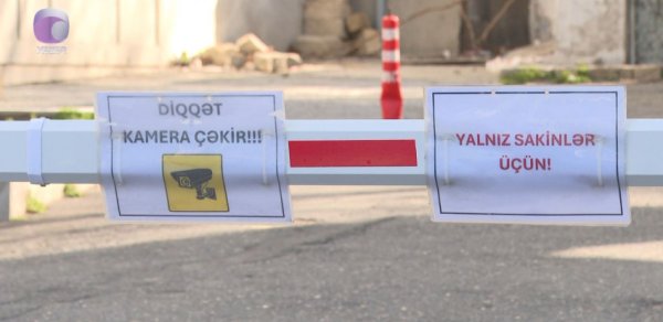 Bakıda bina sakinləri ilə sahibkarlar arasında şlaqbaum “dava”sı - VİDEO
