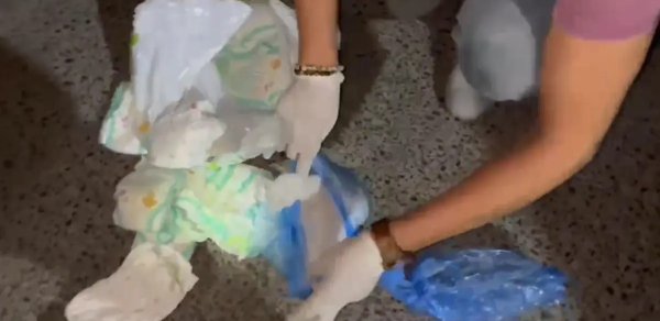 Uşaq bezinin içində narkotik aşkarlandı - Ata və qızı saxlanıldı