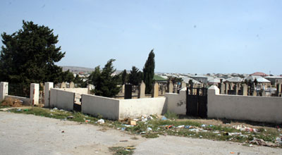 Qadının qəbiristanlıqda dəhşətli intiharı