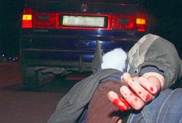 Astarada vətəndaş avtomobillə polisin üzərindən keçdi