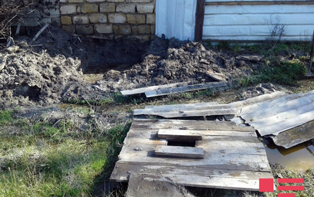 Anasını öldürüb tualetdə basdıran oğul tutuldu