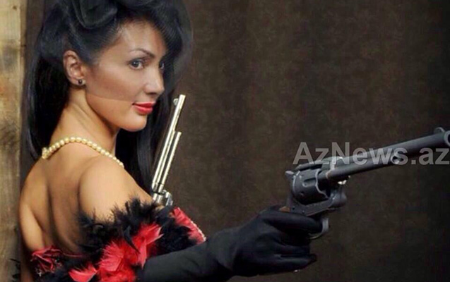 Silahla fotosu yayılan xanım direktora - Yeni vəzifə