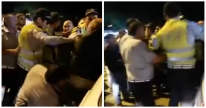 Sürücü ilə yol polisi əməkdaşları arasında dava - VİDEO