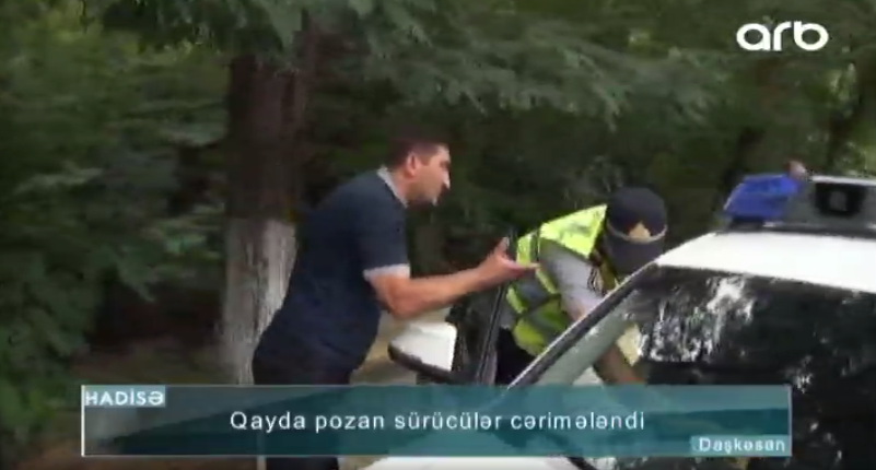 Sürücü polisə etiraz etdi: "Dedim yazma, yekə kişisən" - VİDEO