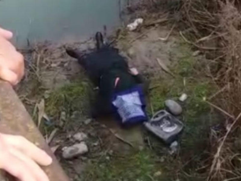 Kanaldan qadın meyiti tapıldı