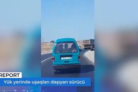 Bakıda sürücü avtomobilin yük yerində uşaqları daşıyıb – VİDEO