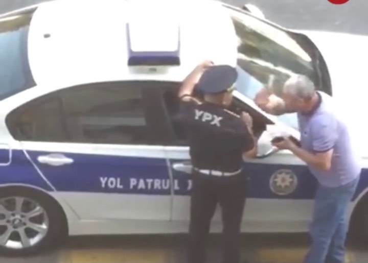 Sürücü tərəfindən söyülən yol polisi təqaüdə göndərildi- VİDEO