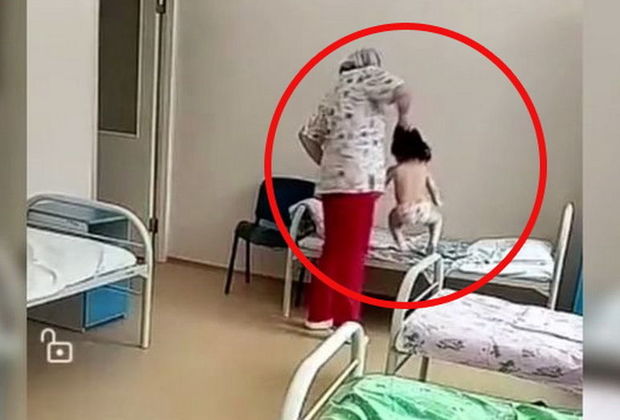 Rusiya xəstəxanasında çəkilən kadrlar şok yaratdı: Uşağın saçından tutub, çarpayıya atdı – VİDEO