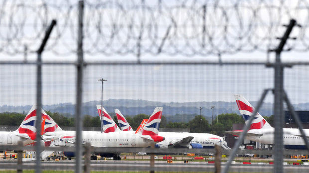Daha bir ölkə koronavirusun yeni növünə görə Britaniya ilə uçuşları dayandırdı