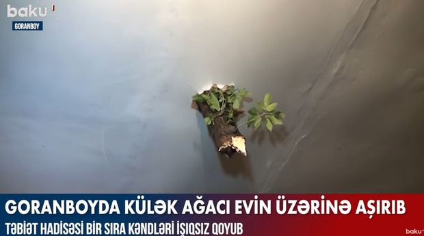 Güclü küləyin qırdığı ağac evin dam örtüyünü deşdi - VİDEO