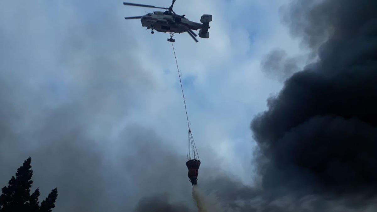 Oğuzda meşə yanğınının söndürülməsinə helikopter cəlb olundu