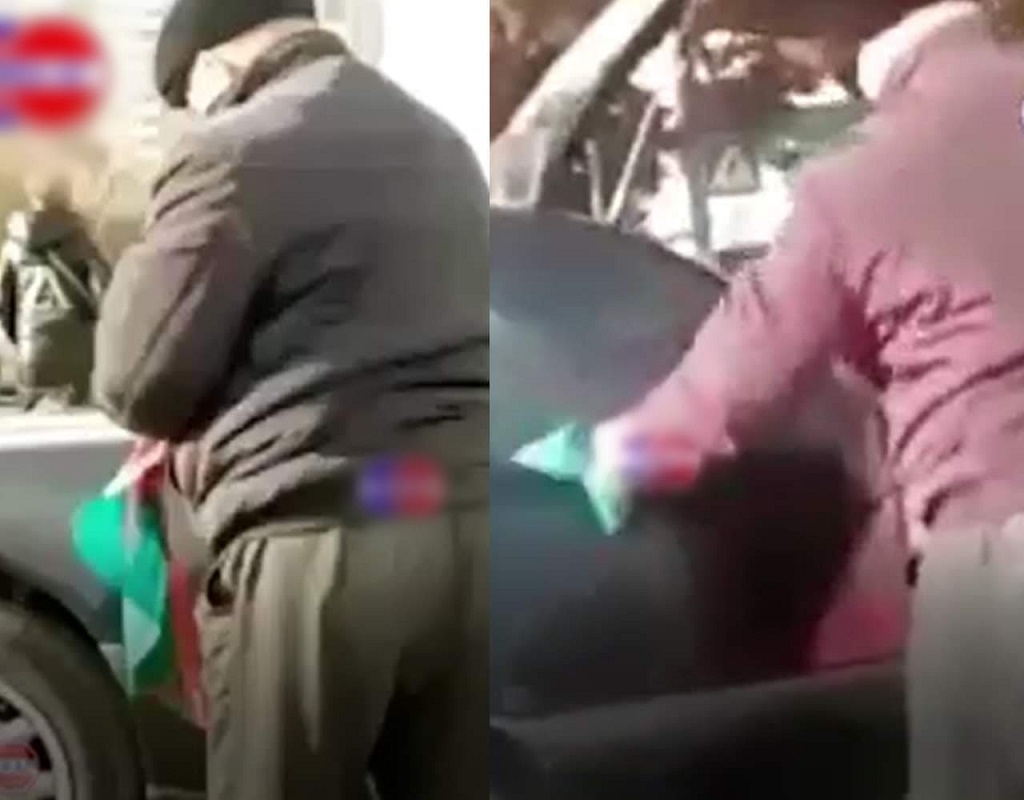 Azərbaycan bayrağı ilə maşınını silən sürücü üzr istədi