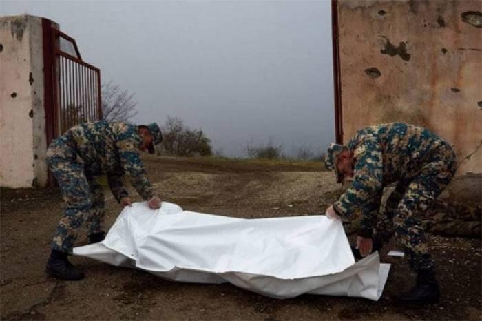 Buçada dəhşət yaşanır - Meyitlər yük maşınlarında saxlanılır