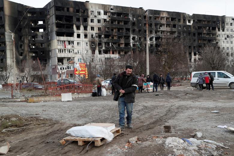 Mariupol yaxınlığında kütləvi məzarlıq aşkar edildi