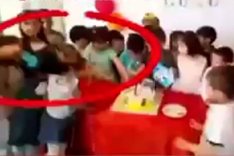 Bağçada uşağın saçını yolan aşpaz cəzalandırıldı - VİDEO 