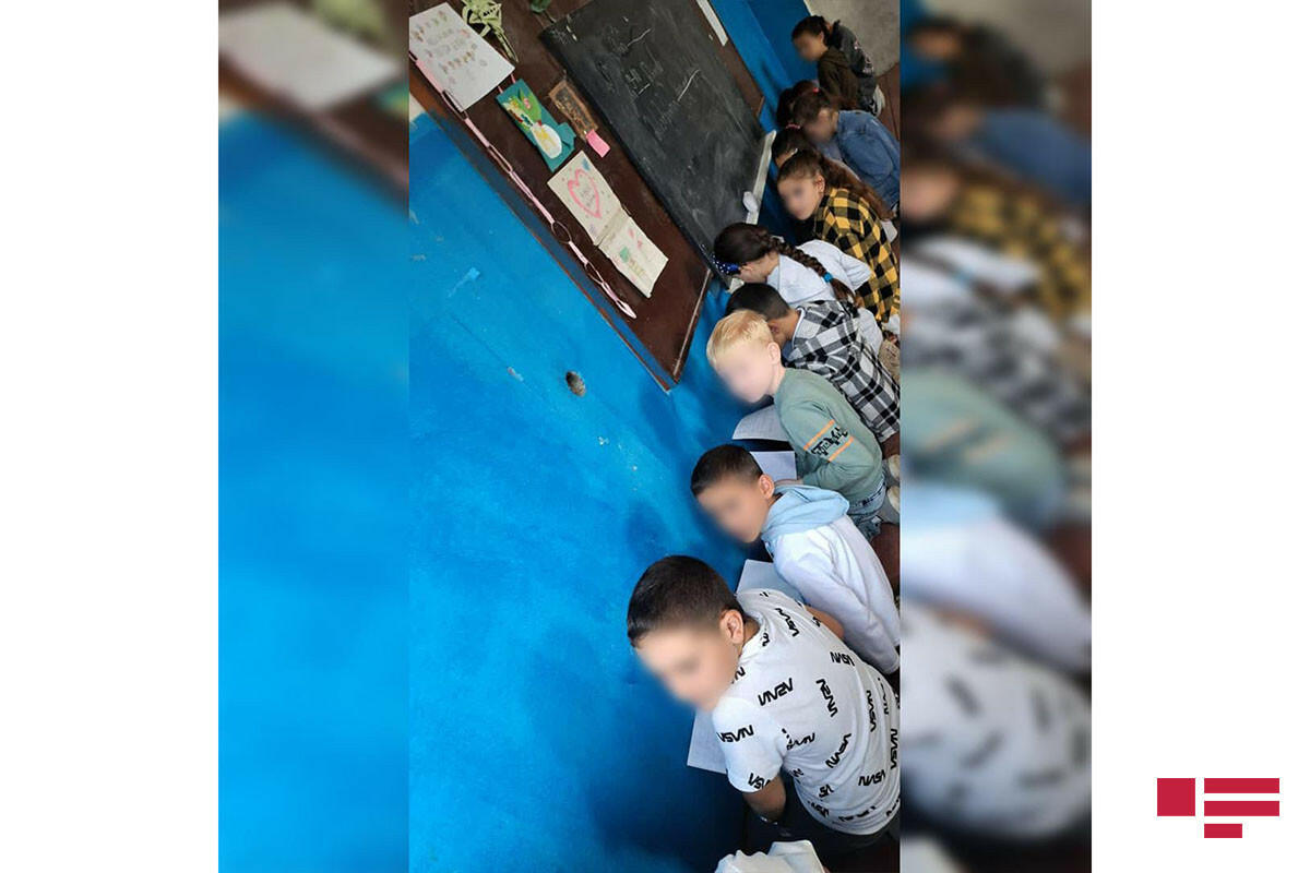 Şagirdləri diz çökdürərək cəzalandıran müəllim işdən çıxarılıb
