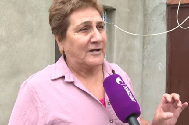 Bakıda narkoman qadın evə silahla basqın edərək pul tələb edib? - VİDEO