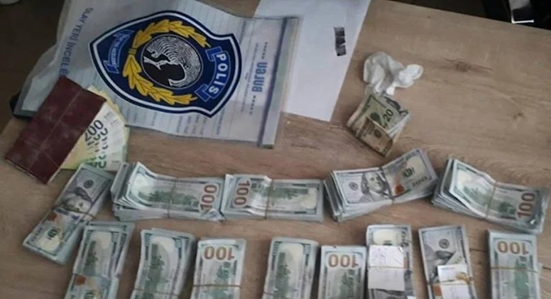 Rusiya xilasedici qrupu dağıntılar arasında 150 min dollar tapdı