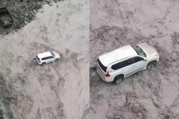 İsmayıllıya qonaq gələn Türkmənistan vətəndaşlarının maşınını sel apardı - VİDEO