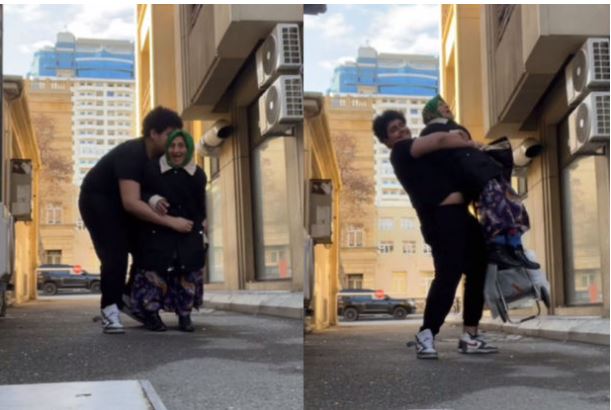 DİN-dən yaşlı qadını qucağına alan yeniyetmə ilə bağlı açıqlama - VİDEO