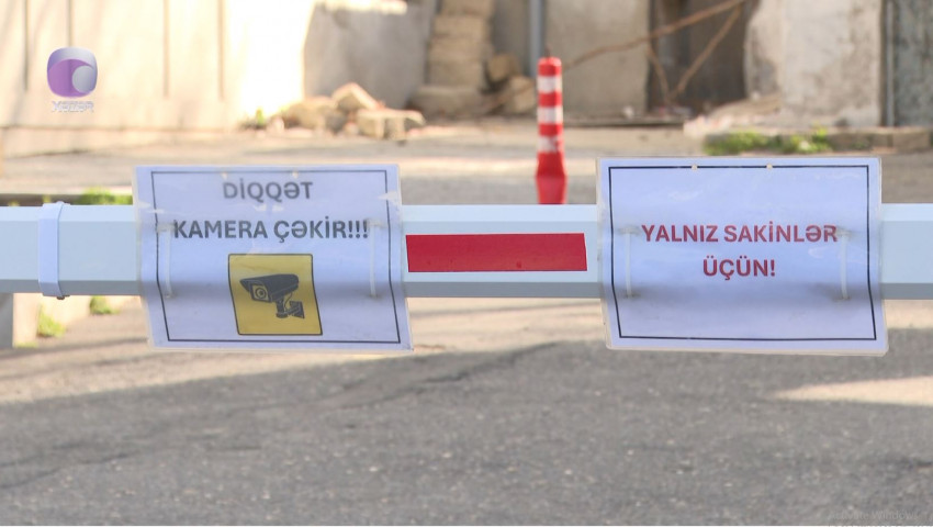 Bakıda bina sakinləri ilə sahibkarlar arasında şlaqbaum “dava”sı - VİDEO