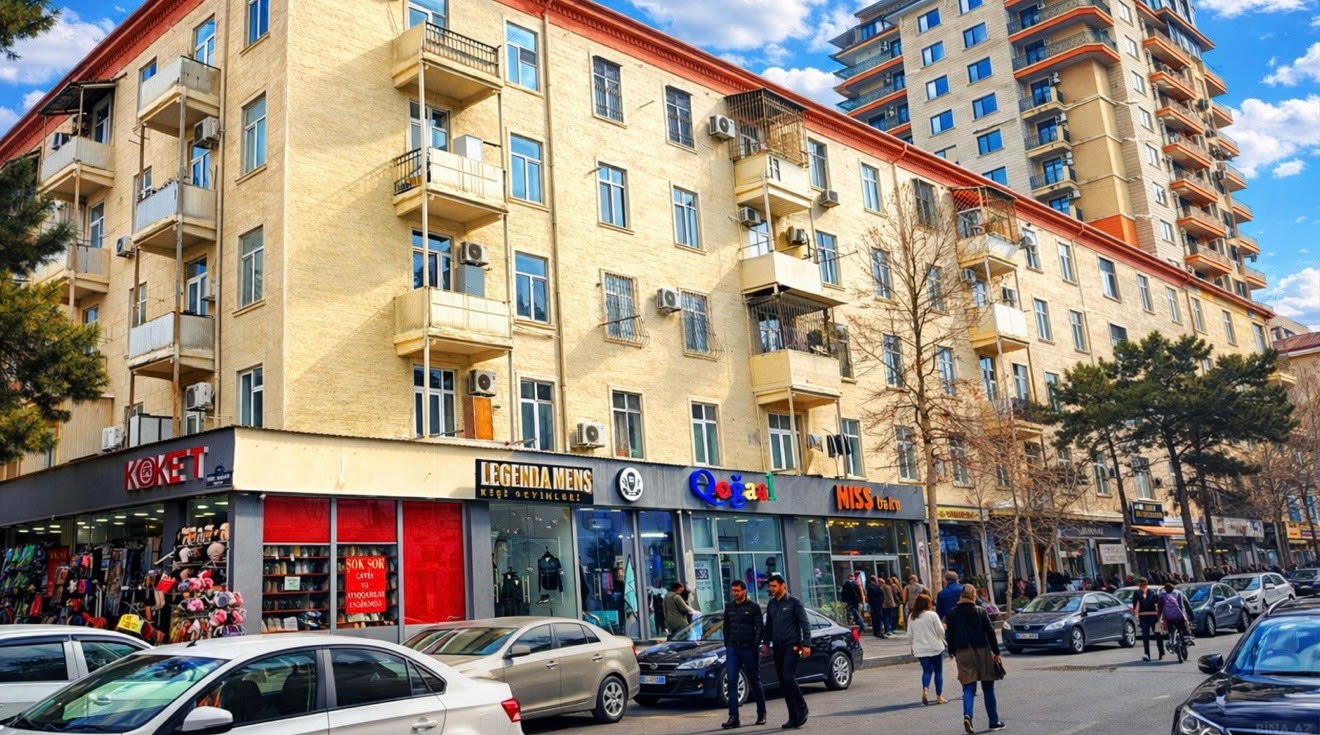 Mənzil əvəzinə obyekt: Binaların altı niyə obyektlərlə dolur?